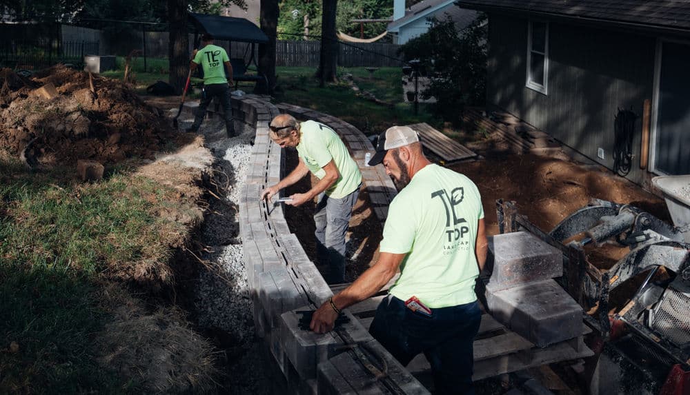 Backyard Transformation with Tiered Retaining Walls